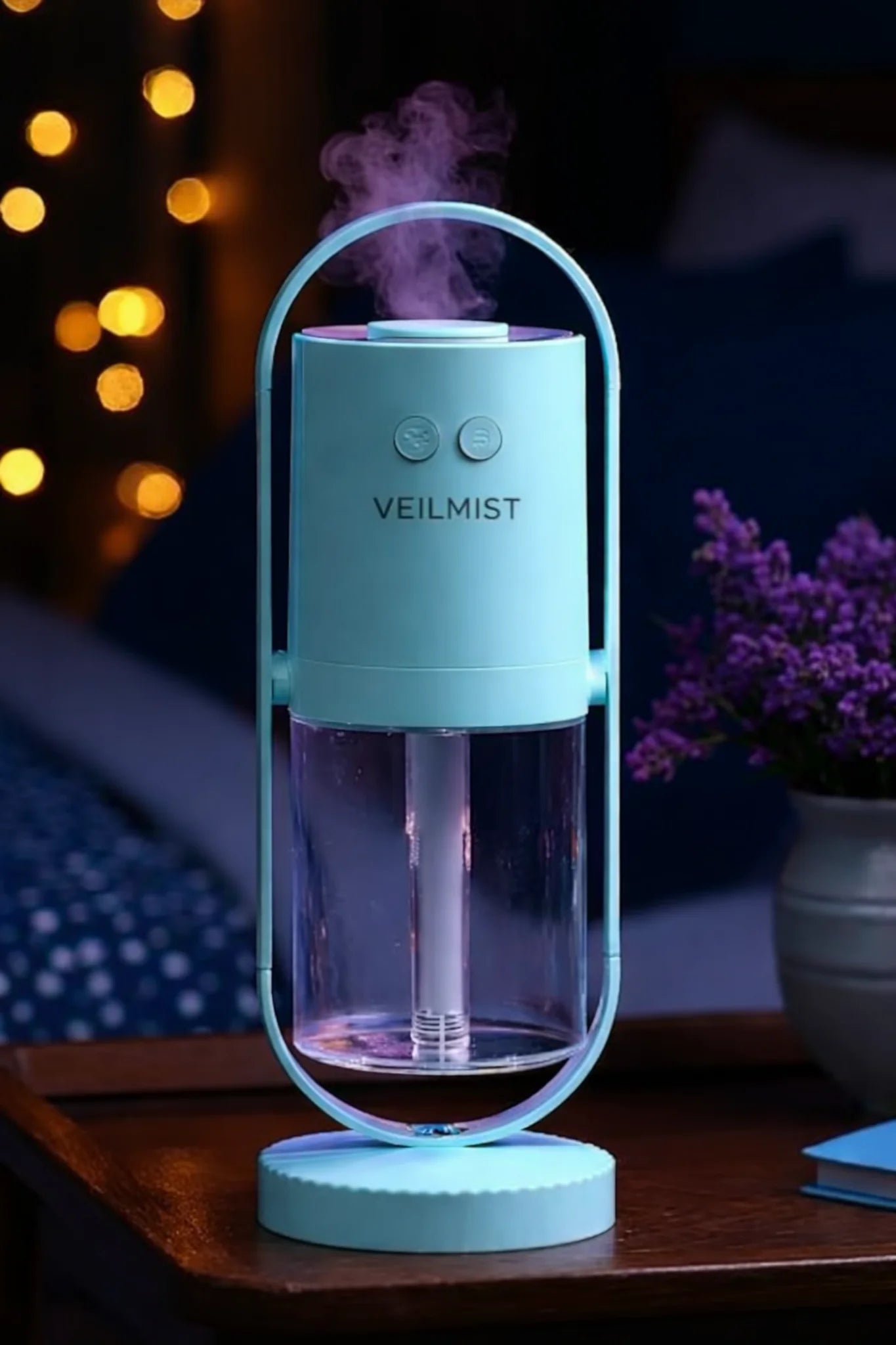 Lumaveil Veilmist USB humidifier creating calming mist atmosphere in sky blue