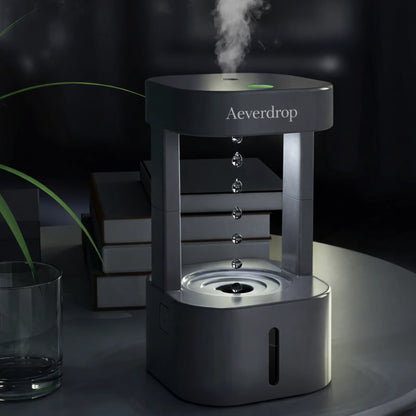 Aeverdrop anti gravity humidifier with ambient lighting on bedside table by Lumaveil