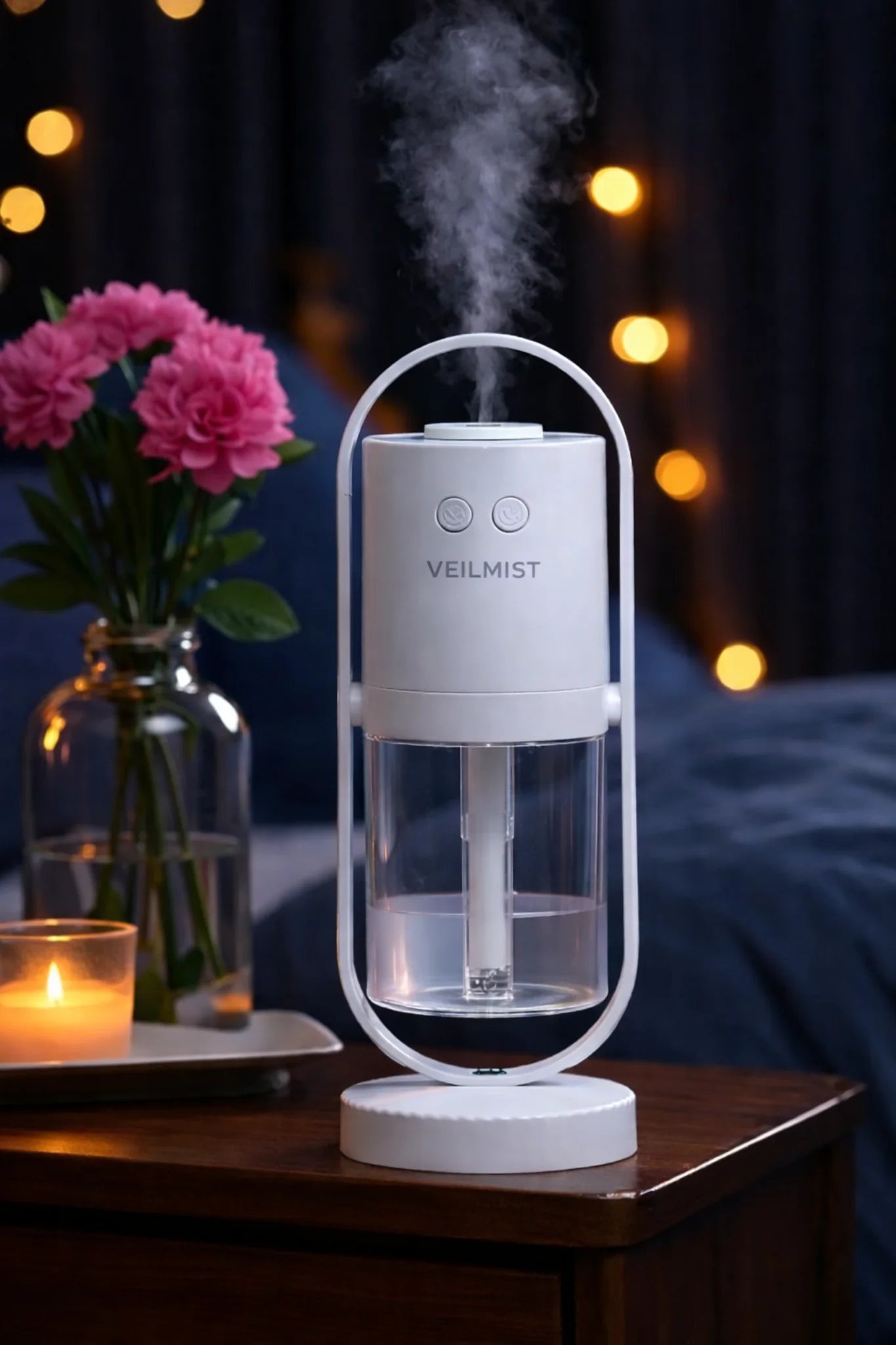 Lumaveil Veilmist minimalist bedroom humidifier with ambient mist in cloud white